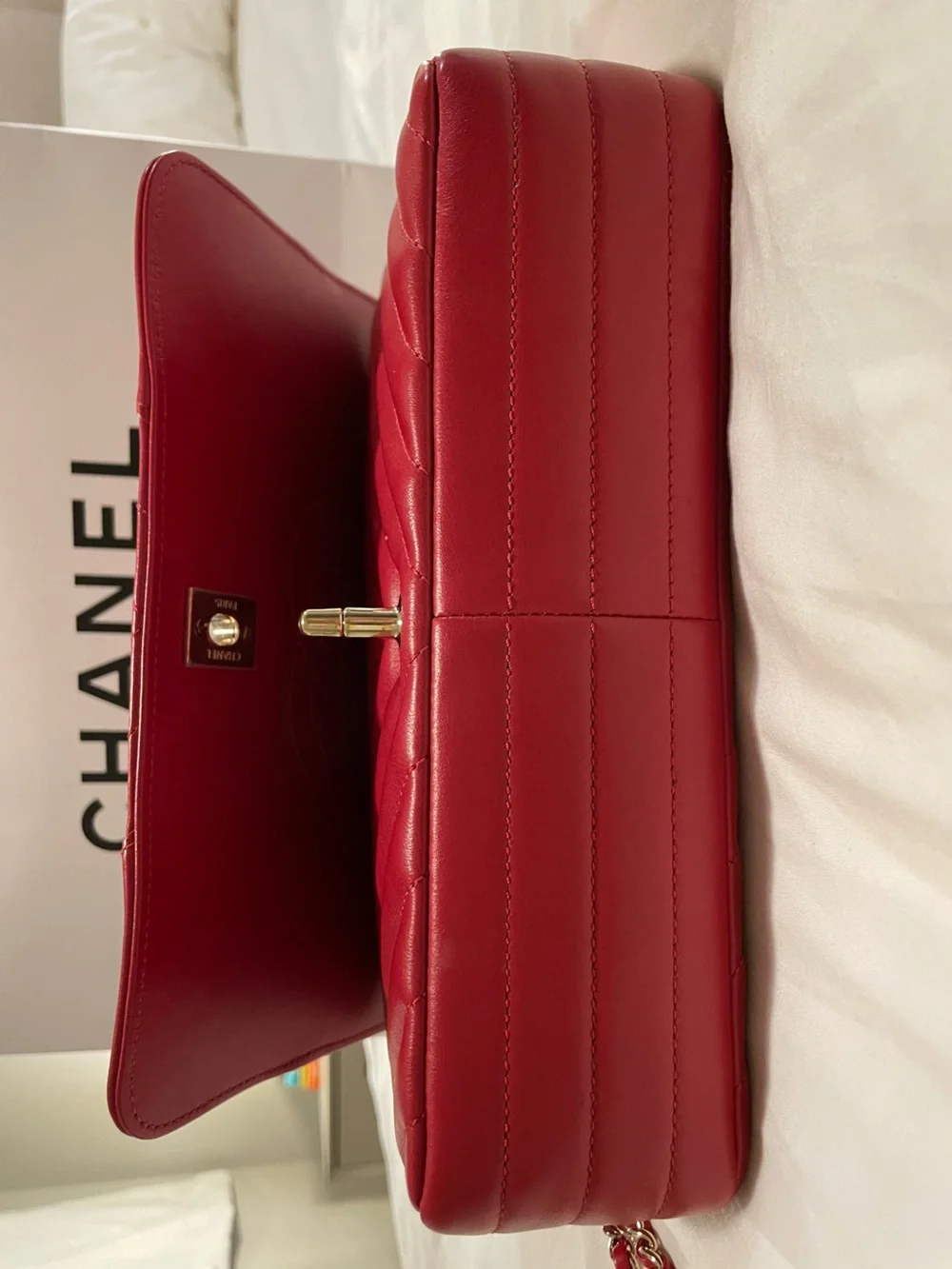 CHANEL Red Quilted Chevron Shoulder Bag with Gold CC Lock